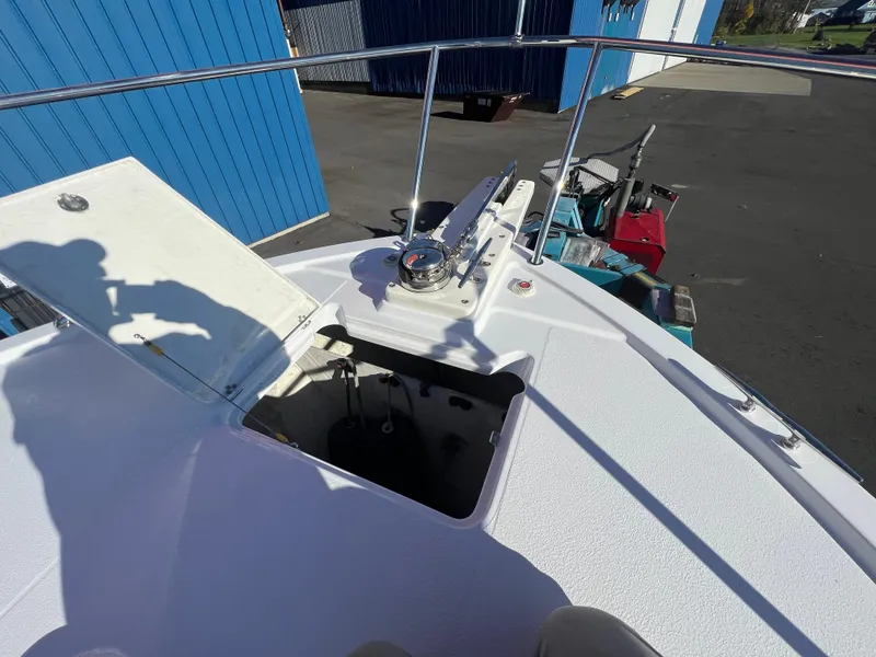 Slide: The Image of 2017 Back Cove Downeast 37 boat deck with open hatch and anchor system. - 21