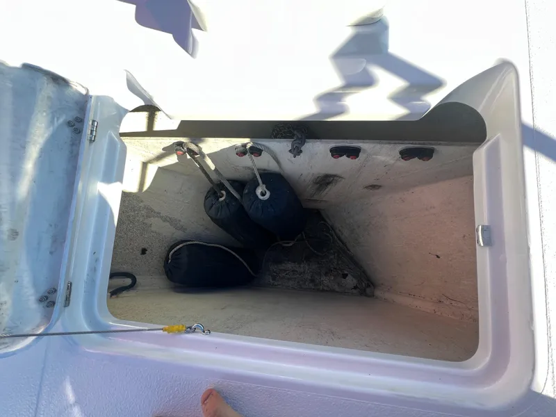 Slide: The Image of Open storage compartment on a 2017 Back Cove Downeast 37 boat. - 22