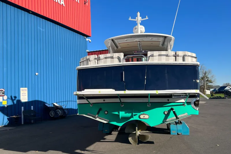 Slide: The Image of 2017 Back Cove Downeast 37 boat on dry dock at a marina. - 7
