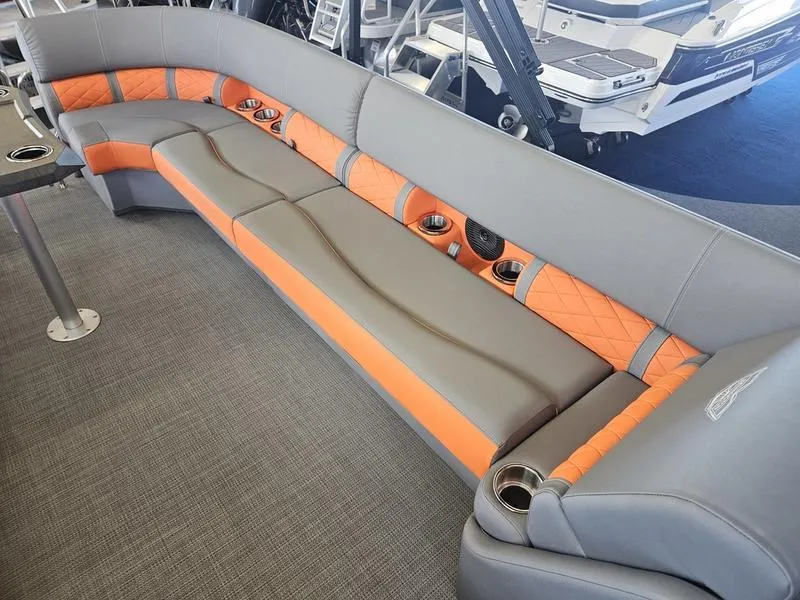Slide: The Image of 2024 Bennington 24LFBC boat with gray and orange seating. - 5