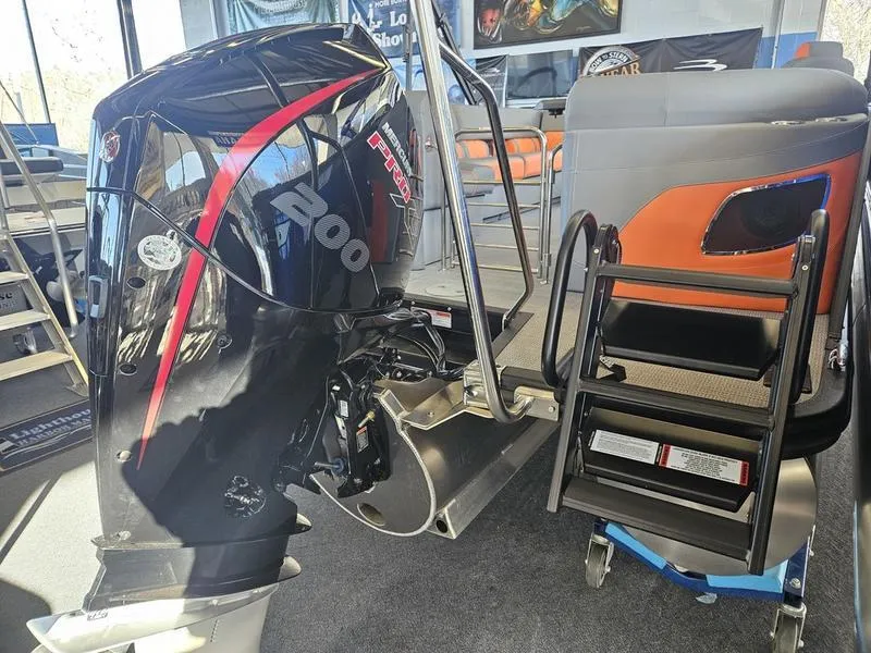 Slide: The Image of 2024 Bennington 24LFBC pontoon boat with a 200 HP Mercury outboard engine. - 9