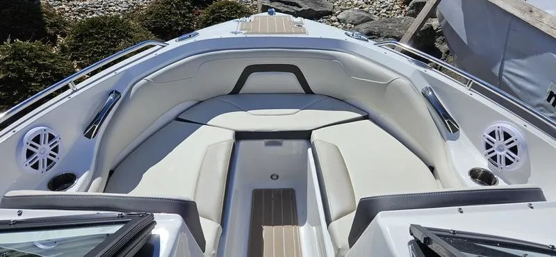 Slide: The Image of 2024 Monterey 224FS boat interior with cushioned seating and modern design. - 3