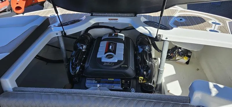 Slide: The Image of 2024 Monterey 224FS boat engine compartment with 250 HP engine. - 8