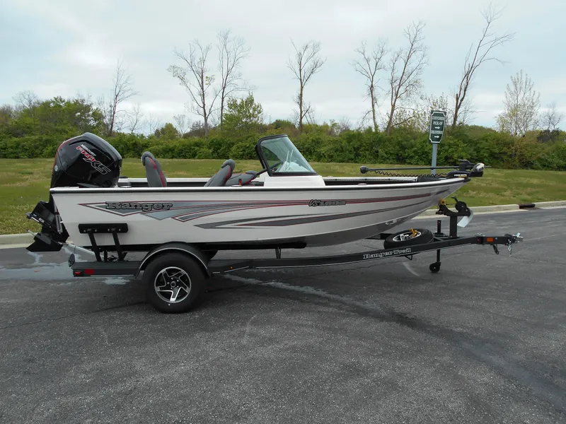 The Image of 2024 Ranger VS1682SC Angler fishing boat on trailer in parking lot. - 0