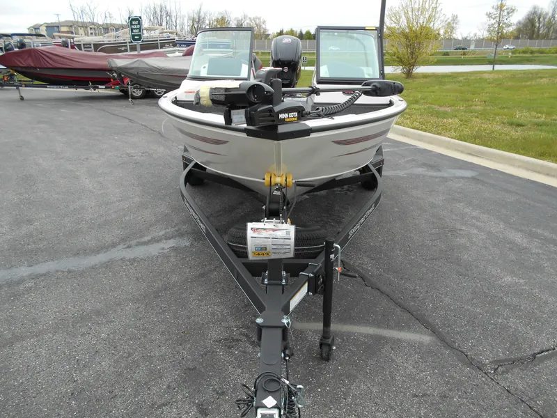 Slide: The Image of 2024 Ranger VS1682SC Angler fishing boat on trailer in parking lot. - 3
