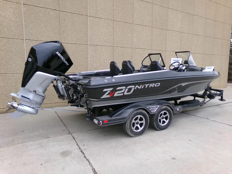 Slide: The Image of 2024 Nitro ZV20 Pro fishing boat on trailer with Mercury outboard motor. - 2