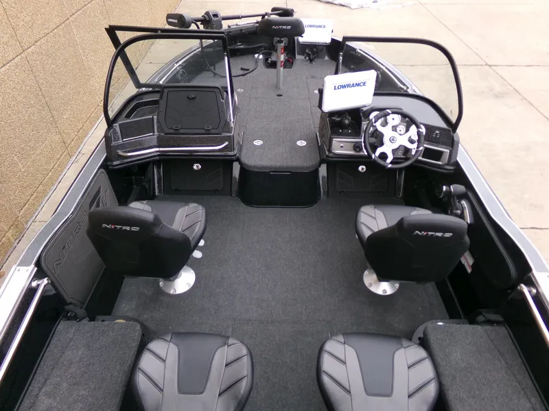 Slide: The Image of 2024 Nitro ZV20 Pro fishing boat interior with dual seats and advanced navigation system. - 3