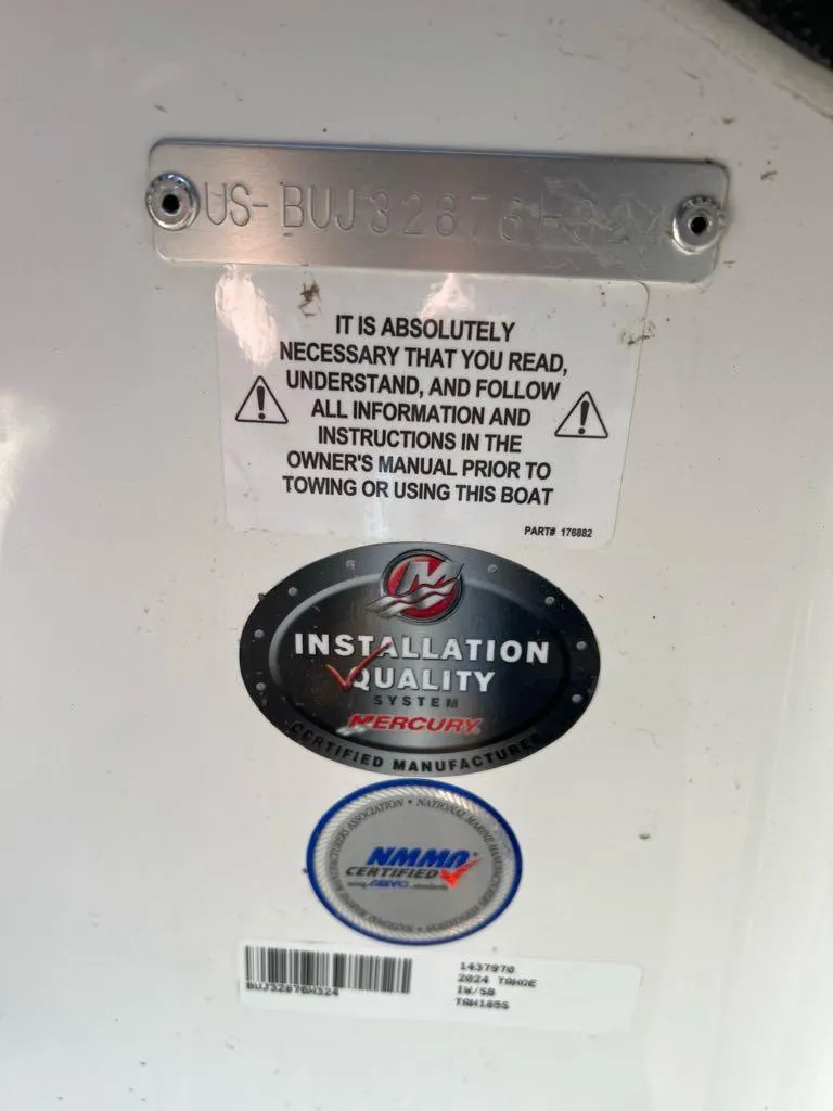 Slide: The Image of Warning and certification labels on a 2024 Tahoe 185 S boat. - 5