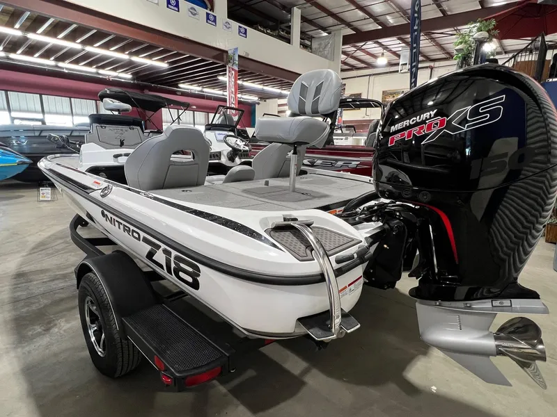 Slide: The Image of 2024 Nitro Z18 boat with Mercury Pro XS engine in showroom. - 3
