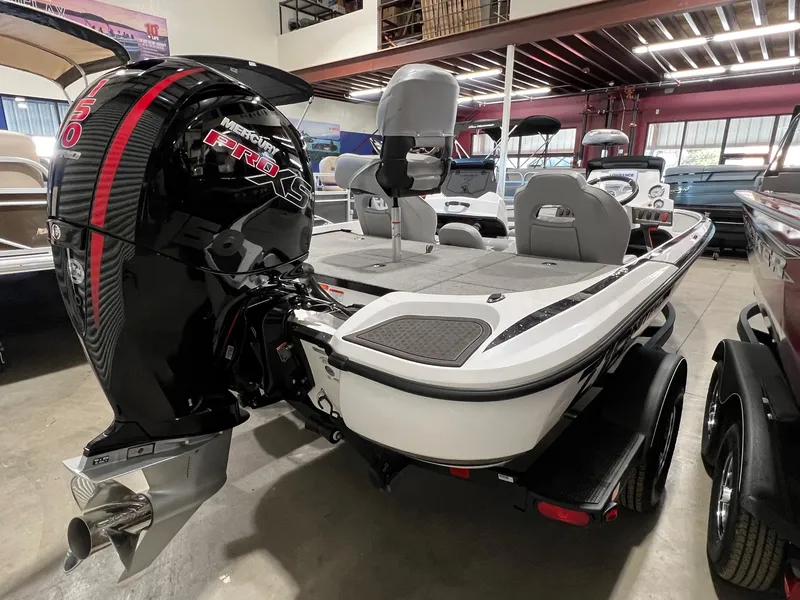 Slide: The Image of 2024 Nitro Z18 boat with powerful engine in showroom. - 5
