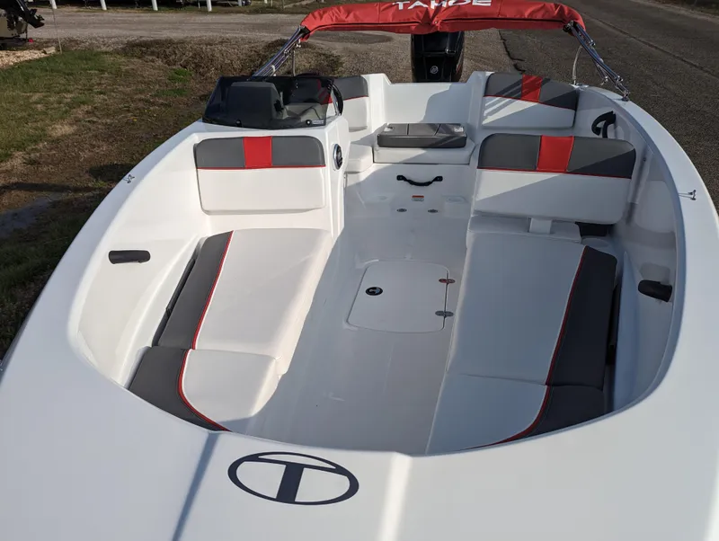 Slide: The Image of 2024 Tahoe T16 boat interior with red and gray seating. - 13