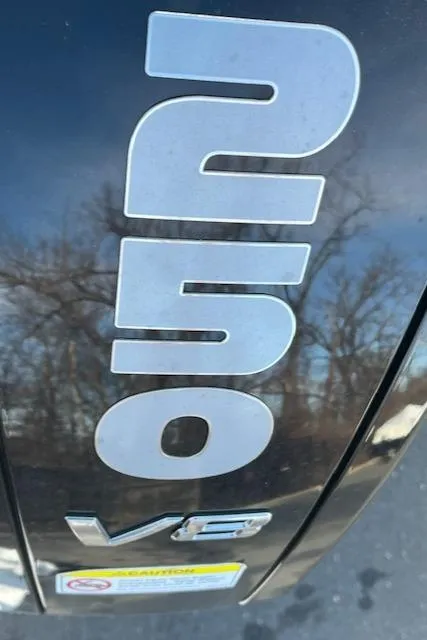 Slide: The Image of 2024 Regency 230 LE3 V8 engine badge close-up - 6