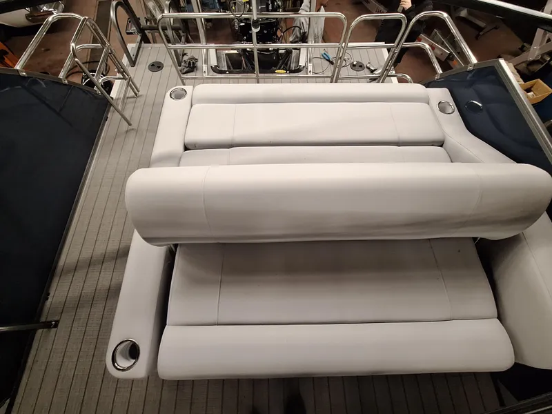 Slide: The Image of 2024 Bentley Pontoons Legacy 243 Swingback interior seating area. - 6