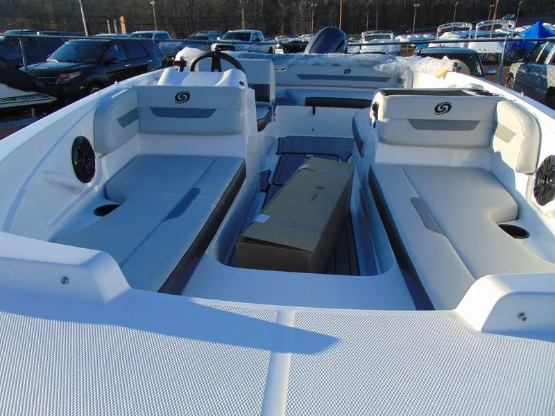 Slide: The Image of 2024 Hurricane SunDeck Sport 185 OB boat interior with seating and storage. - 4