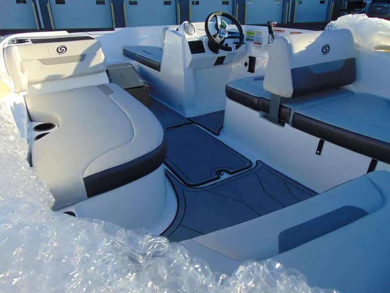 Slide: The Image of 2024 Hurricane SunDeck Sport 185 OB interior with seating and steering console. - 8