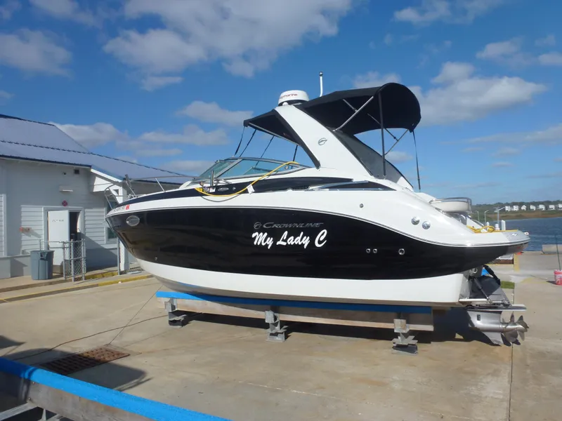The Image of 2019 Crownline 264 CR boat named My Lady C on a dock. - 1