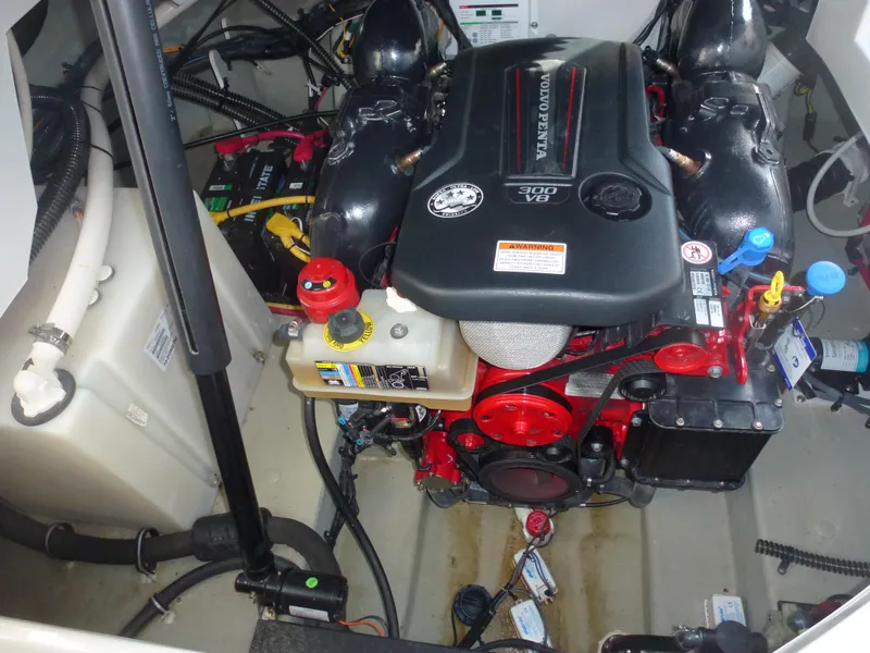 Slide: The Image of 2019 Crownline 264 CR boat engine compartment with Volvo Penta V8 motor. - 18