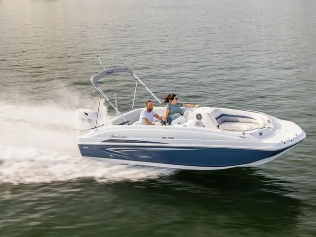 Slide: The Image of 2024 Hurricane SunDeck Sport 188 OB cruising on open water. - 1