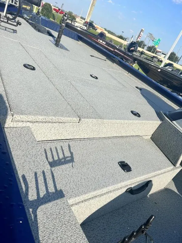 Slide: The Image of 2017 G3 Sportsman 19 boat deck with storage compartments. - 11