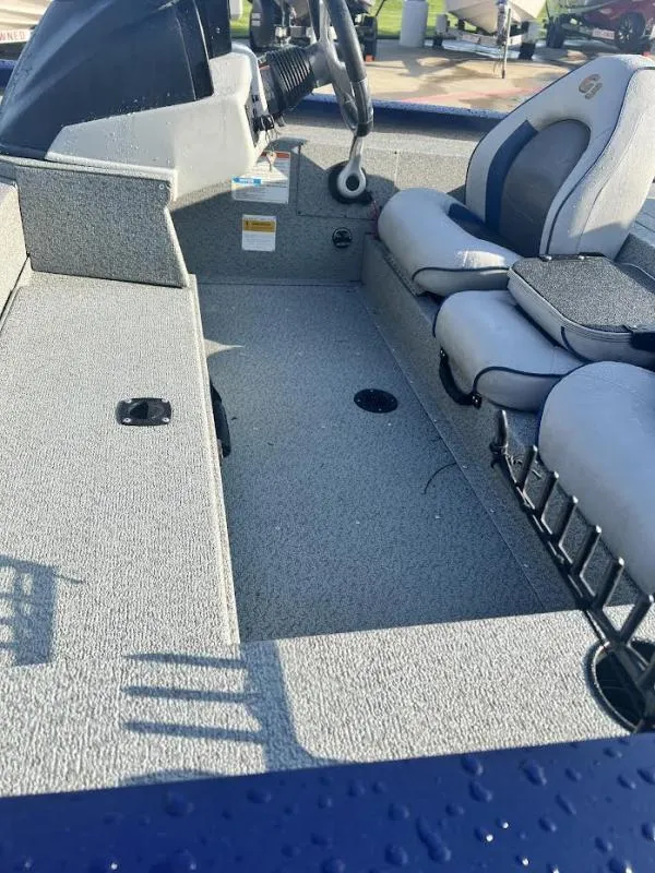 Slide: The Image of 2017 G3 Sportsman 19 boat interior with steering wheel and seating. - 9