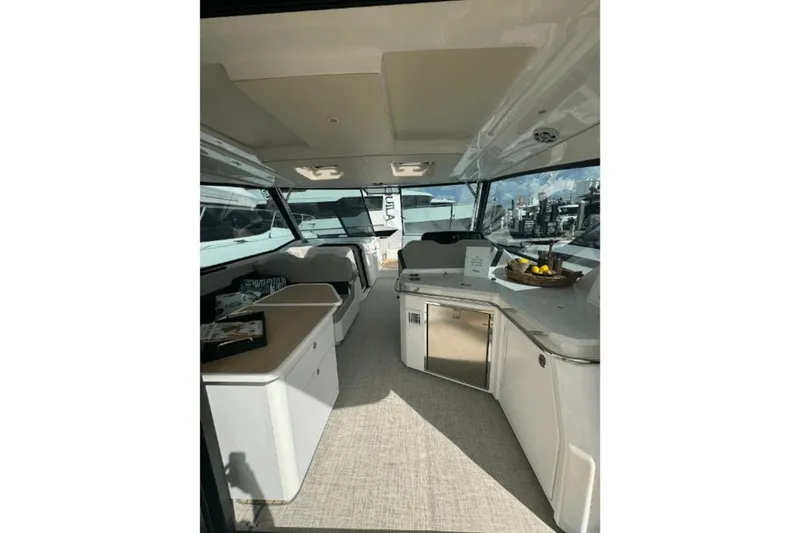 Slide: The Image of Interior of 2024 Aquila 36 Sport yacht with modern amenities and sleek design. - 9