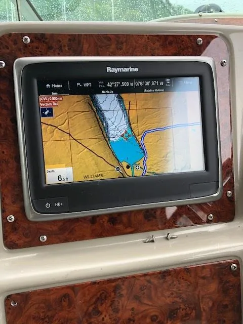 Slide: The Image of Raymarine navigation system on a 1998 Maxum 3700 SCR boat. - 27