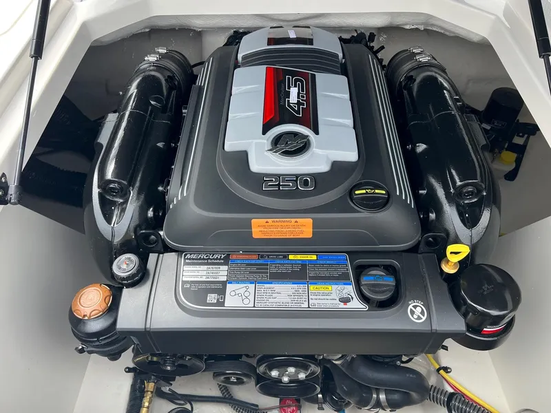 Slide: The Image of 2024 Chaparral 21 SSi engine compartment showcasing a powerful Mercury 4.5L 250 HP engine. - 6