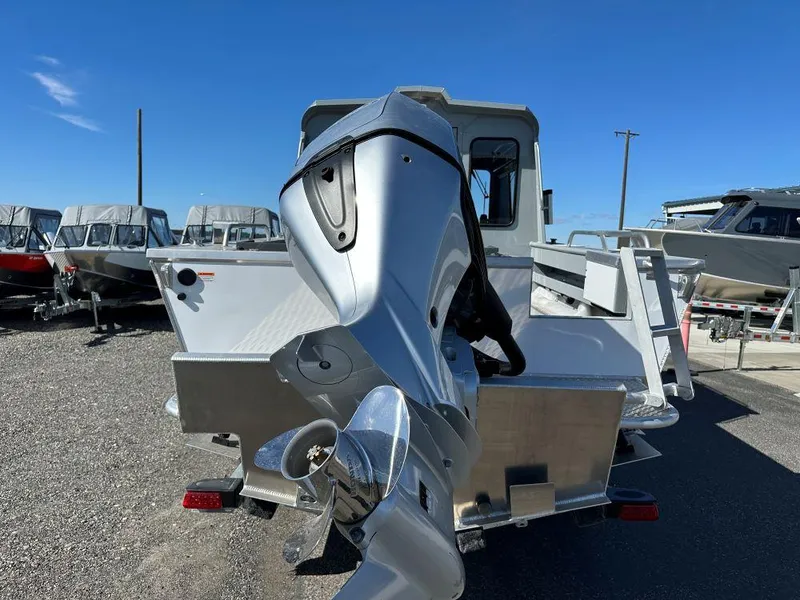 Slide: The Image of 2024 Hewescraft 220 Ocean Pro HT ET boat rear view with outboard motor. - 3