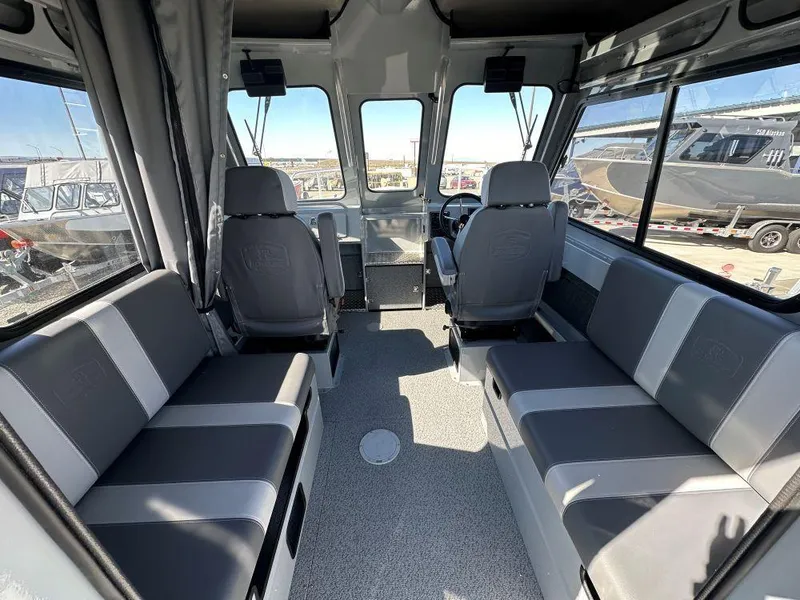 Slide: The Image of Interior of 2024 Hewescraft 220 Ocean Pro HT ET boat with seating and steering console. - 5