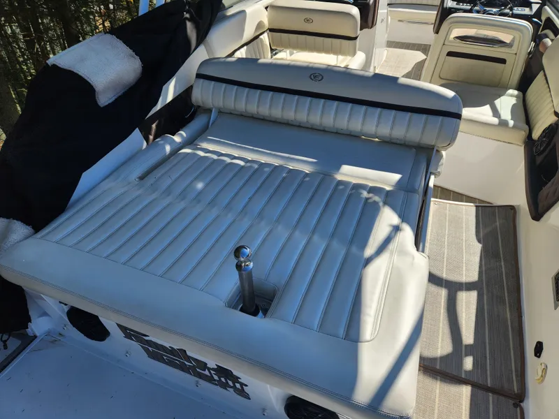 Slide: The Image of 2011 Cobalt A25 boat with white leather seating and sun deck. - 10