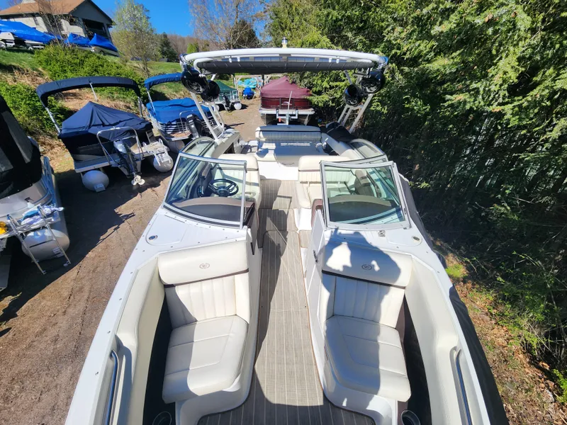 Slide: The Image of 2011 Cobalt A25 boat with spacious seating and sleek design. - 19