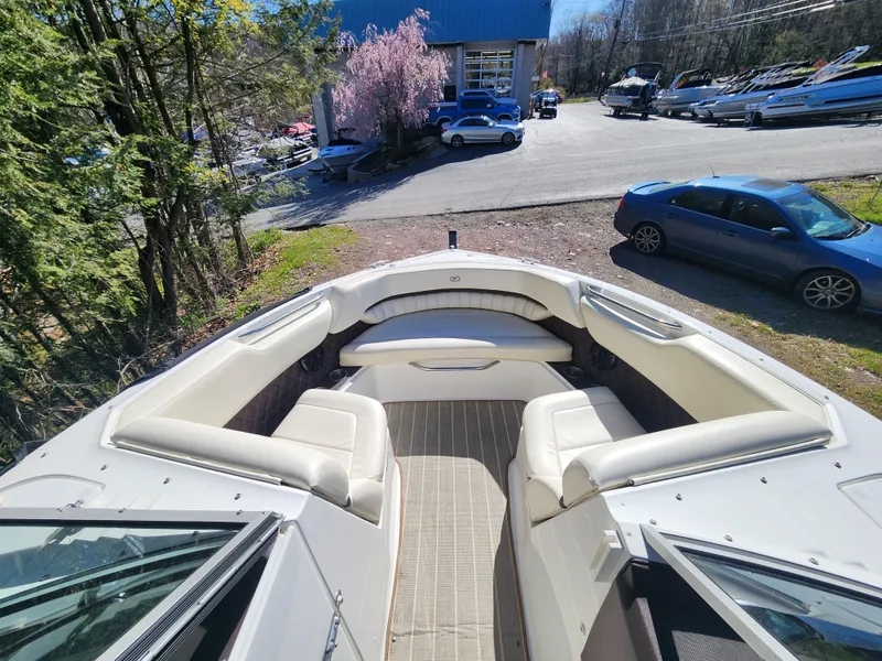 Slide: The Image of 2011 Cobalt A25 boat with spacious seating and modern design. - 21