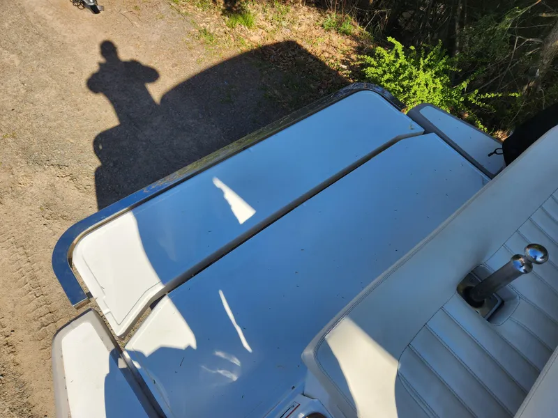 Slide: The Image of 2011 Cobalt A25 boat rear deck and seating area in sunlight. - 7