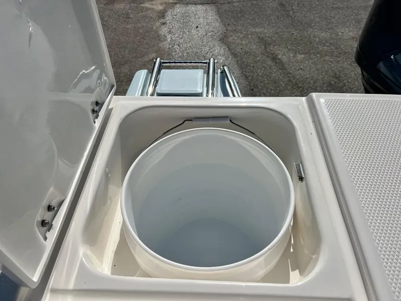 Slide: The Image of Livewell compartment on a 2024 Robalo 246 Cayman boat. - 15