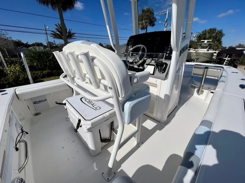 Slide: The Image of 2024 Robalo 246 Cayman boat interior with helm station and seating. - 20