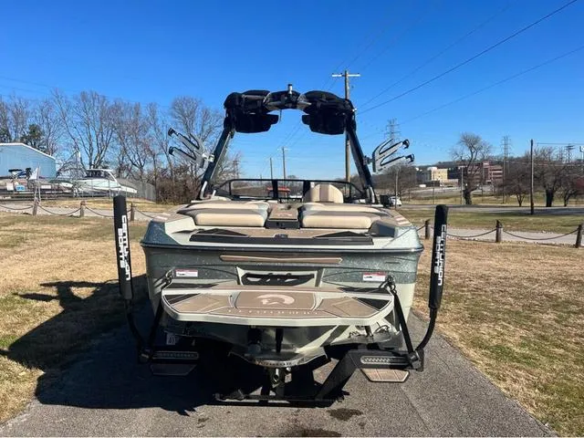 Slide: The Image of 2022 Centurion Ri230 boat on a sunny day, rear view. - 4