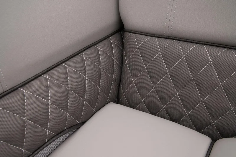 Slide: The Image of 2024 Ranger Reata 223C boat interior with under-seat storage. - 22