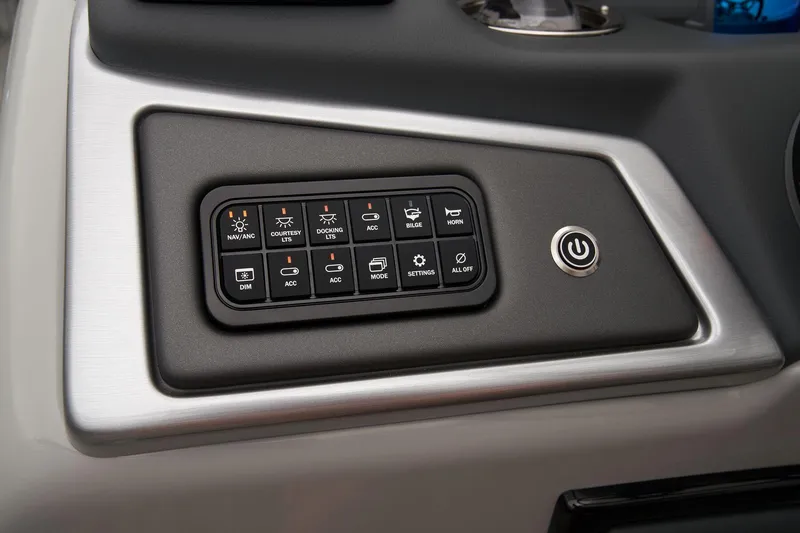 Slide: The Image of 2024 Ranger Reata 223C boat console with steering wheel and controls. - 39