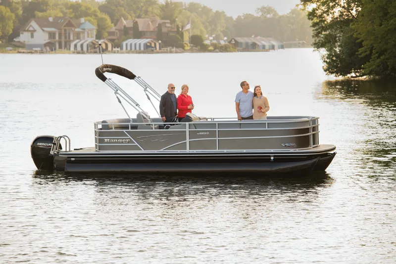 Slide: The Image of 2024 Ranger Reata 223C boat interior with gray seating and table. - 49
