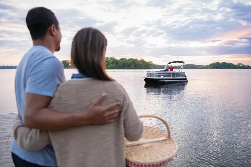 Slide: The Image of 2024 Ranger Reata 223C boat interior with under-seat storage compartments. - 51