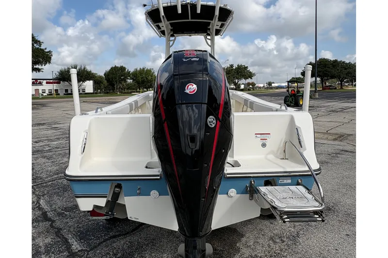Slide: The Image of The image shows a 2024 Mako 214 Center Console boat with an outboard motor. - 8