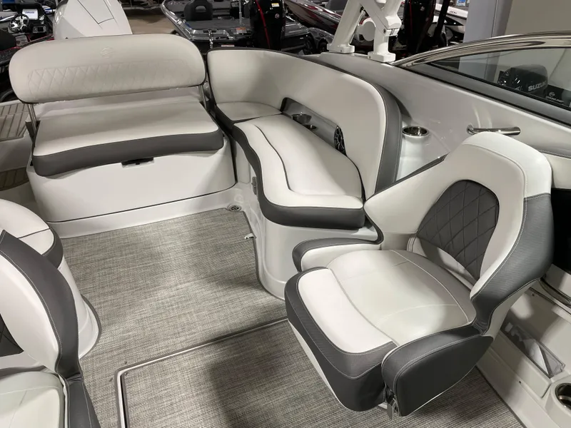 Slide: The Image of 2024 Crownline Eclipse E260 XS boat interior with luxurious seating and modern design. - 11