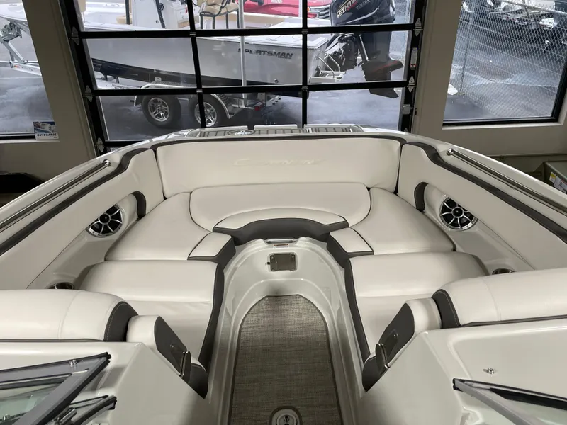 Slide: The Image of 2024 Crownline Eclipse E260 XS boat interior with luxurious seating. - 9