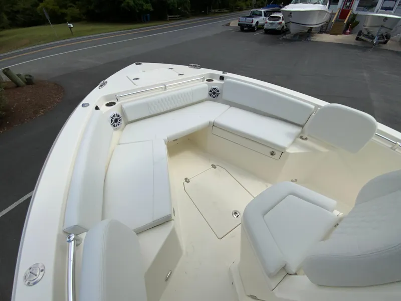 Slide: The Image of 2025 Cobia 240 Center Console boat with spacious seating and modern design. - 21