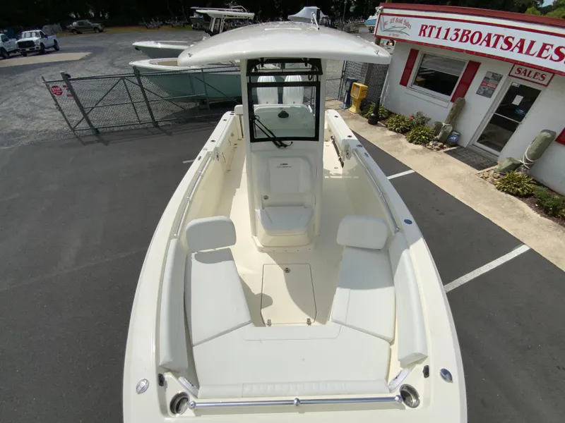 Slide: The Image of 2025 Cobia 240 Center Console boat at dealership, top view. - 23