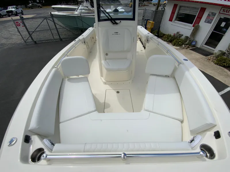 Slide: The Image of 2025 Cobia 240 Center Console boat with spacious seating and sleek design. - 24