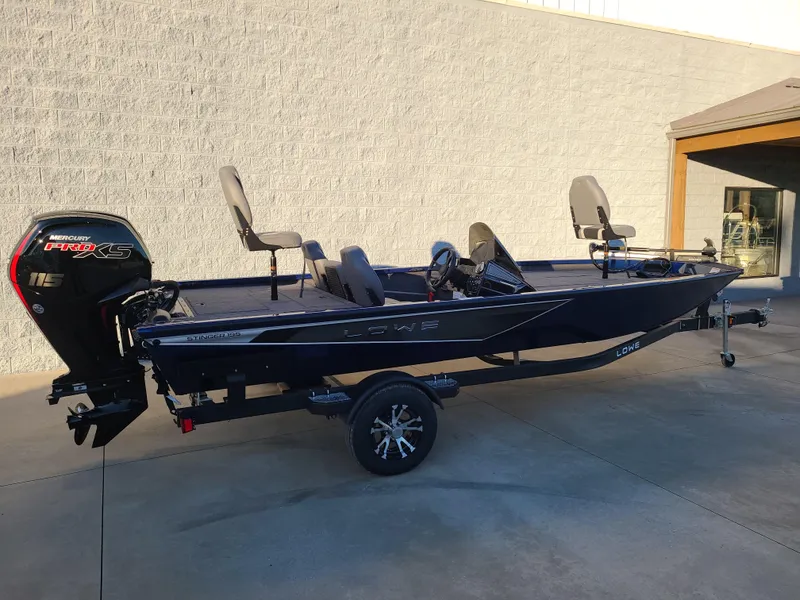 Slide: The Image of 2024 Lowe ST195B fishing boat with Mercury Pro XS engine on trailer. - 8