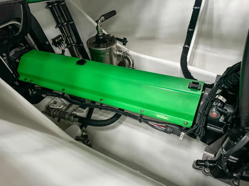 Slide: The Image of Green engine component in 2021 Skater 50 boat interior. - 17