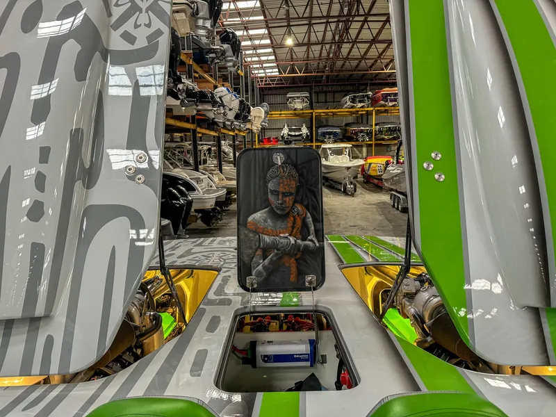 Slide: The Image of Skater 50 boat interior with vibrant design in a warehouse, 2021 model. - 28