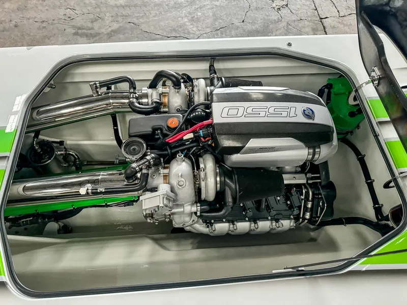 Slide: The Image of High-performance engine in a 2021 Skater 50 boat, featuring OSSI branding. - 40